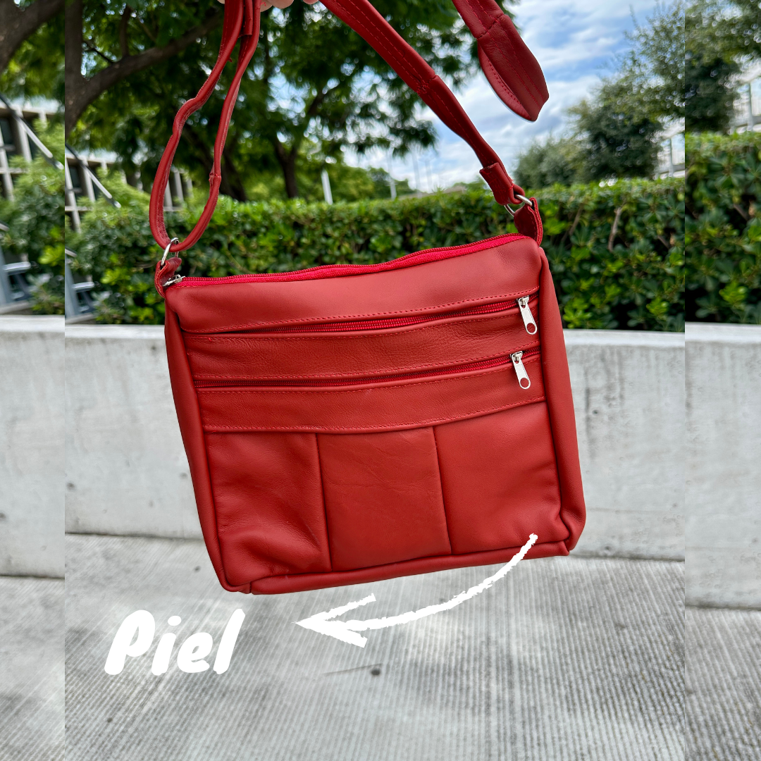 Bolsa de piel para dama color rojo con correa ajustable